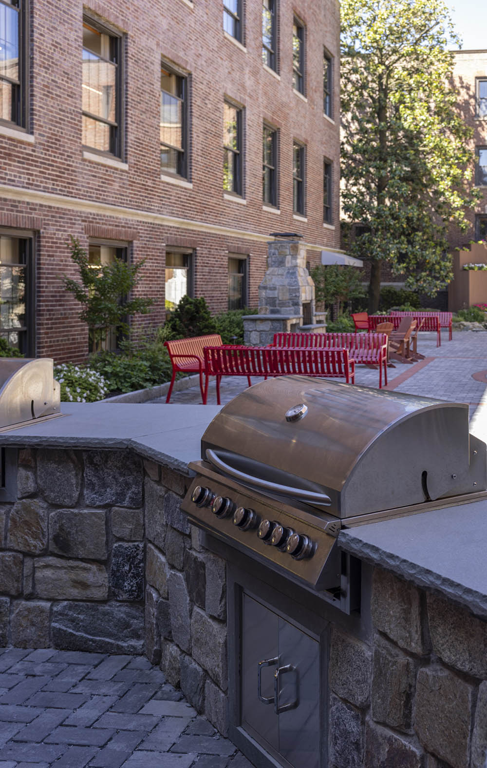 outdoor kitchen, fireplace, and seating